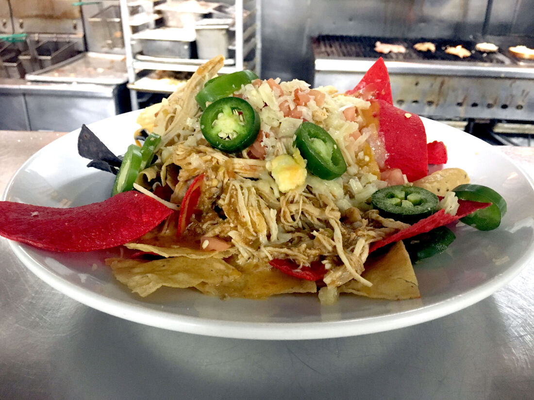 Southwest salad with avocado, tortilla strips and chipotle dressing